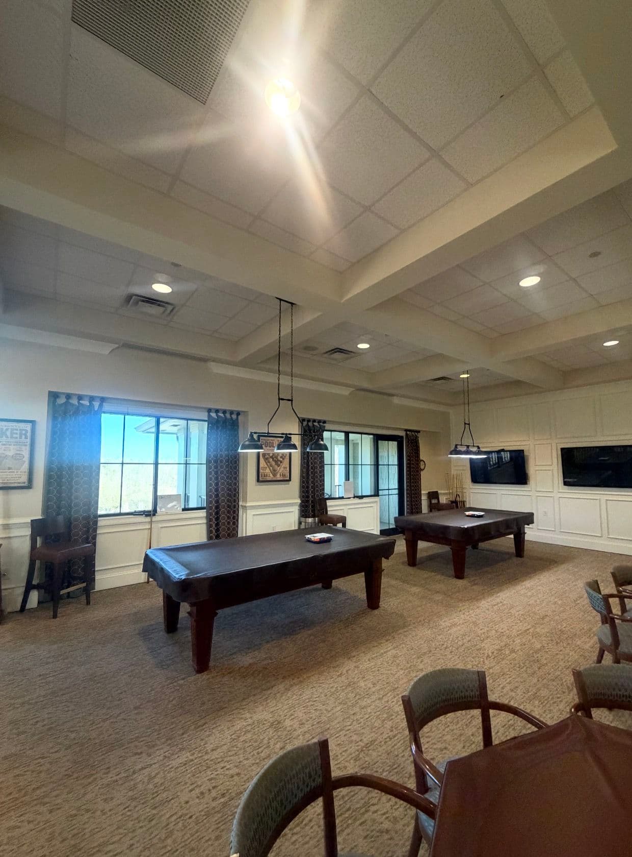 Custom Lighting Installation Above Clubhouse Pool Tables image