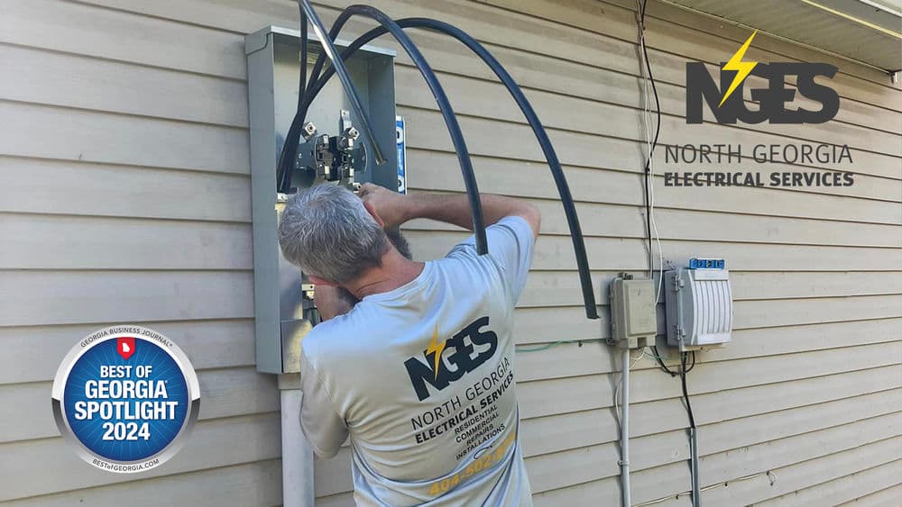 Electrician working on an electrical panel, North Georgia Electrical Services logo, Best of Georgia 2024.